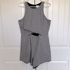 Size M Saylor 1 piece jumpsuit/shorts with pockets & back zipper.